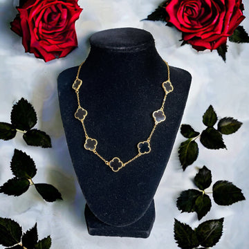 Iqrit Black and pleated Gold necklace