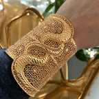 Turmussaya Pleated Gold Bracelet and ring