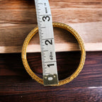 Al-Rmla pleated gold 6pcs Bangle