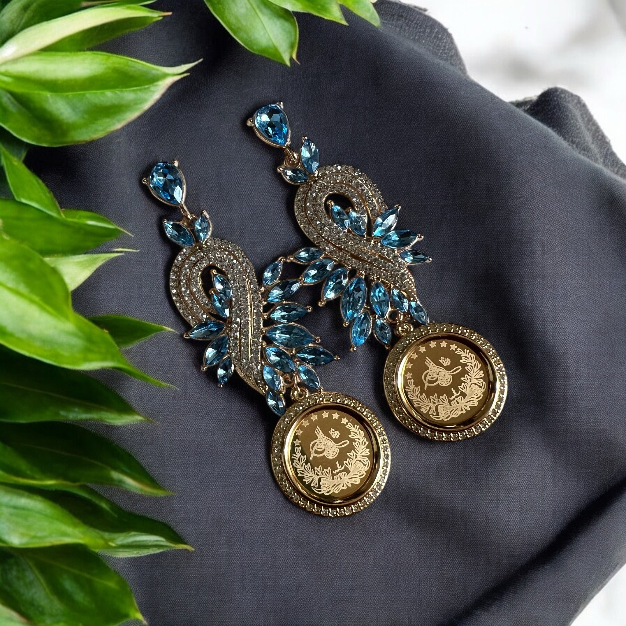 Al-Khadr light blue and gold earrings