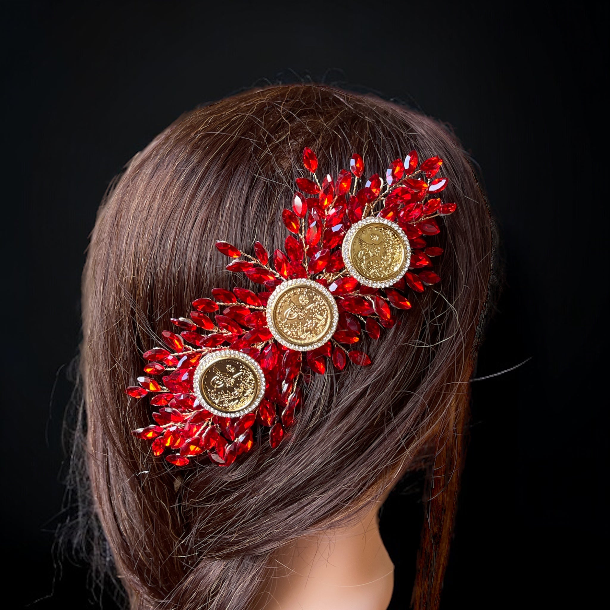 Al Fulija II three coins red and gold