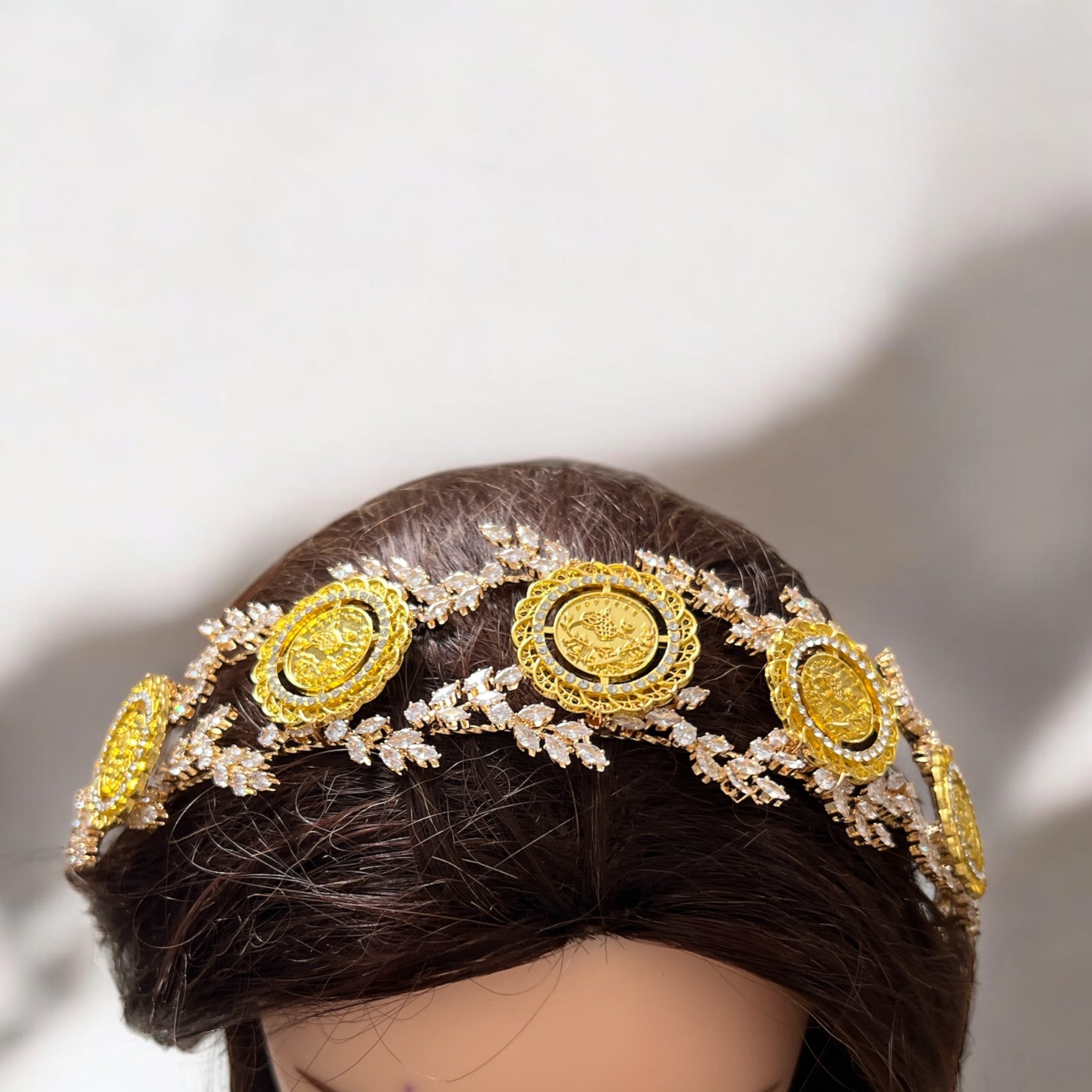 Kh. Bayt Ta'mir five coins headpiece