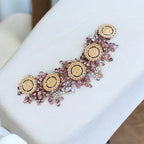 Surif II five coins purple headpiece