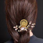 Makr light Pink and Gold coin comb hair accessories styled in hair, showcasing elegance and organization.