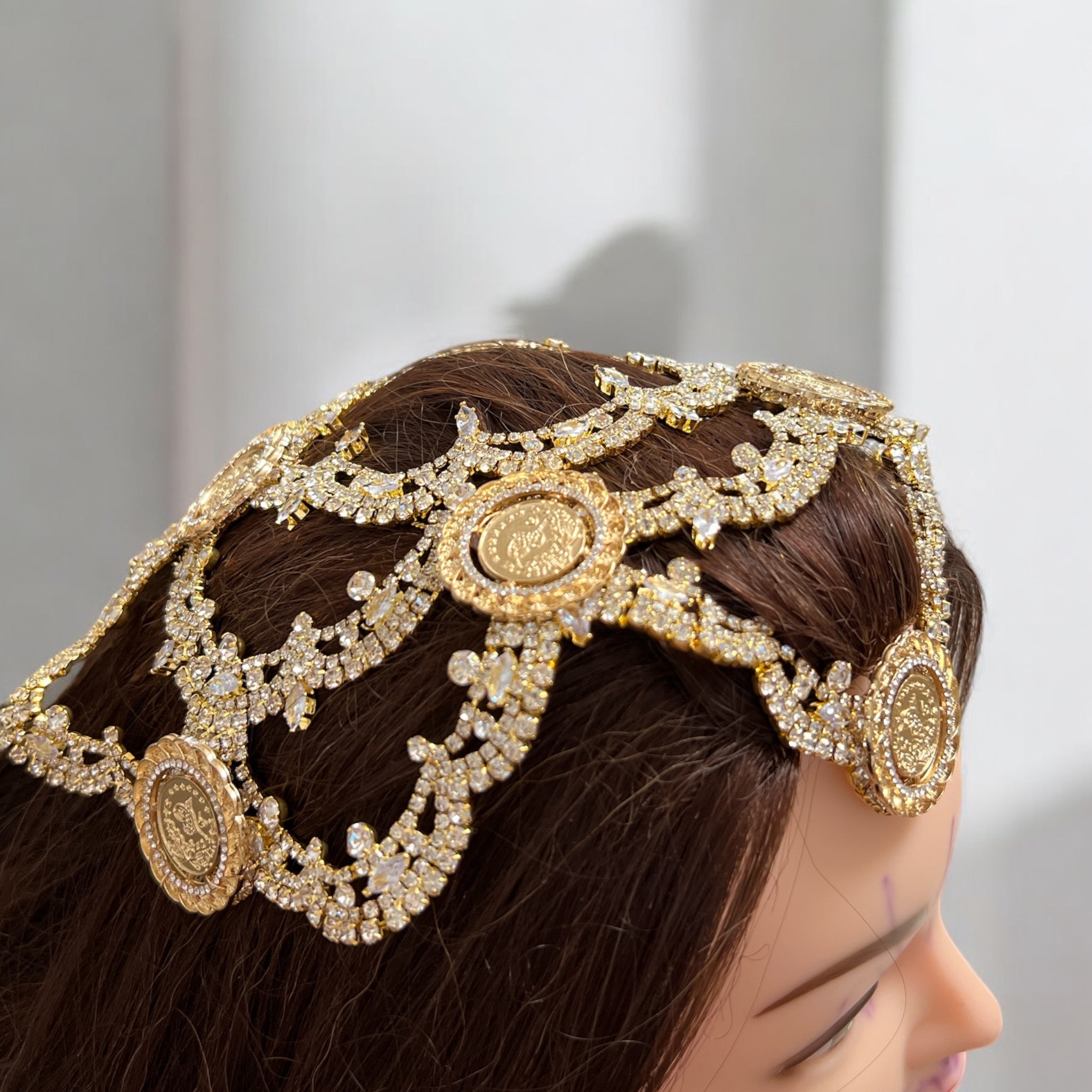 Raba eight coins head piece