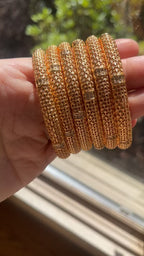 Al-Rmla pleated gold 6pcs Bangle