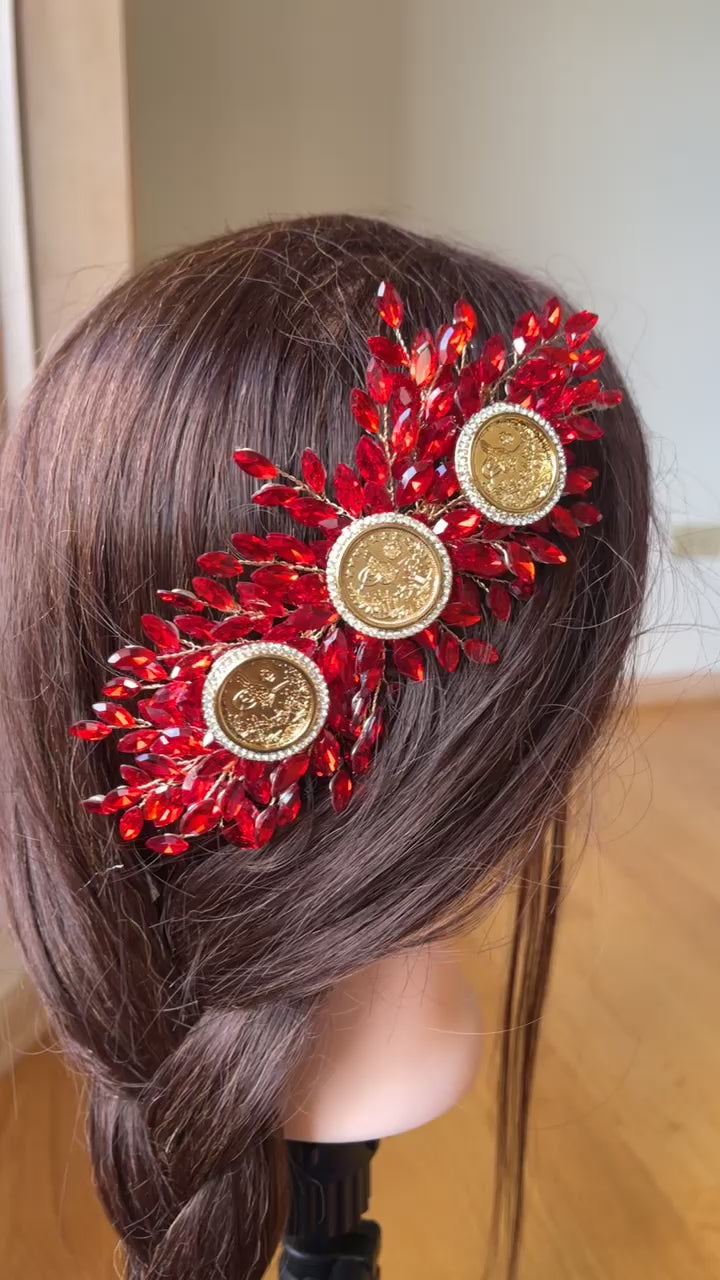 Al Fulija II three coins red and gold