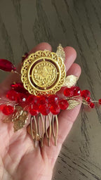 Makr Red Gold one coin comb hair accessories featuring a gold coin and red bead design.