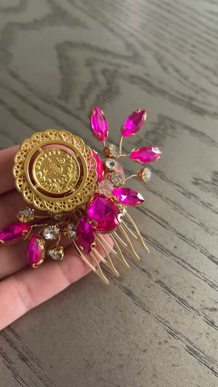 Makr Pink and Gold coin comb hair accessories featuring a floral design with pink gems and gold accents.