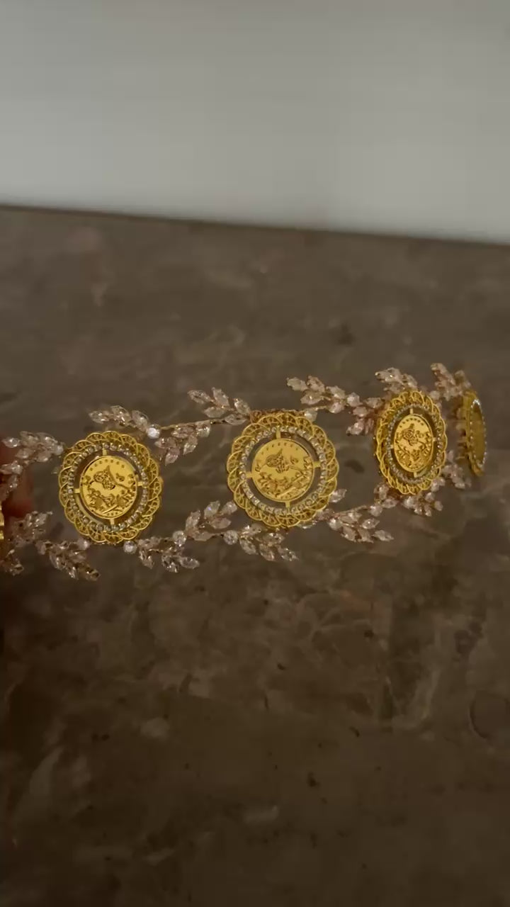 Kh. Bayt Ta'mir five coins headpiece