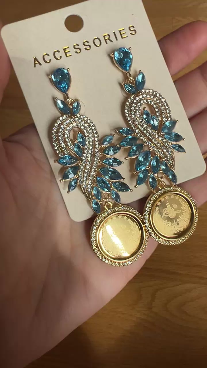 Al-Khadr light blue and gold earrings