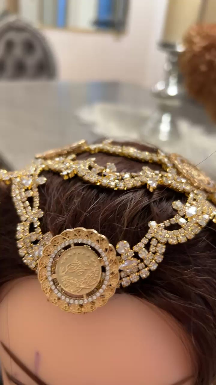 Raba eight coins head piece